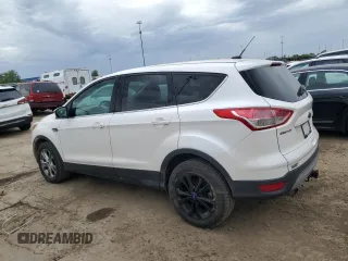 2014 Ford Escape SE z VIN 1FMCU9G96EUD93590, wystawiony jako Copart lot #57810015 z przebiegiem 146 919 mil mil oraz Czysty tytuł • Clean title. Historia ofert i sprzedaży dostępna na DreamBid. Obrazek 2.