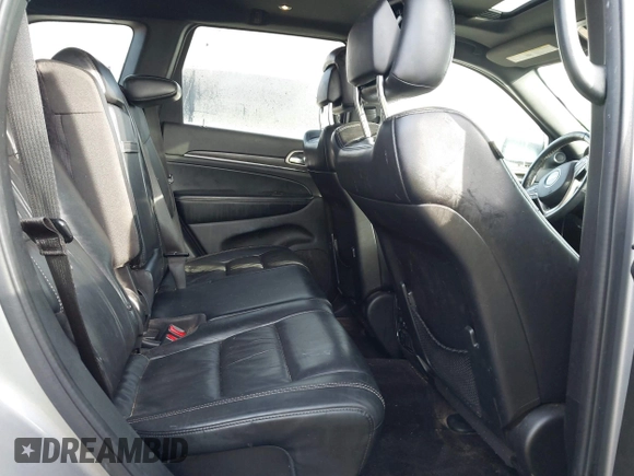 2016 Jeep Grand Cherokee Limited 75th Anniversary with VIN 1C4RJFBG5GC401277, listed as a IAAI auction lot 41119644 with 156,658 mi miles and . Bid and sale history available at DreamBid. Image 8.