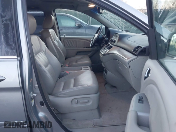 2009 Honda Odyssey EX-L with VIN 5FNRL387X9B005030, listed as a IAAI auction lot 41775144 with 155,531 mi miles. Bid and sale history available at carsss.com. Image 5.