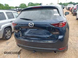 2020 Mazda CX-5 Touring with VIN JM3KFBCM9L0741535, listed as a IAAI auction lot 42101763 with 54,004 mi miles and . Bid and sale history available at DreamBid. Image 16.