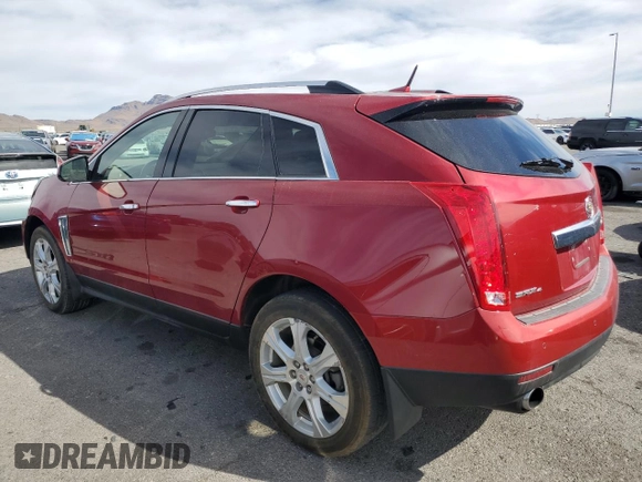 2013 Cadillac SRX Performance Collection with VIN 3GYFNHE34DS517677, listed as a Copart auction lot 50057855 with 126,499 mi miles and Salvage Title. Bid and sale history available at carsss.com. Image 2.