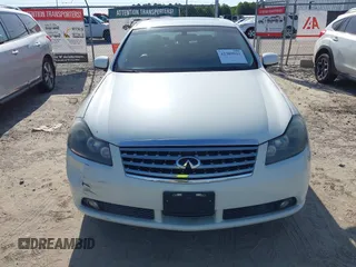 2006 Infiniti M z VIN JNKAY01E46M110394, wystawiony jako IAAI lot #42309941 z przebiegiem 140 240 mil mil oraz . Historia ofert i sprzedaży dostępna na DreamBid. Obrazek 14.