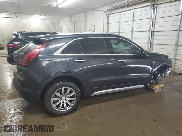 2023 Cadillac XT4 AWD Premium Luxury z VIN 1GYFZDR43PF174188, wystawiony jako Copart lot #59106355 z przebiegiem 27 530 mil mil oraz Szkoda całkowita • Salvage title. Historia ofert i sprzedaży dostępna na DreamBid. Obrazek 3.