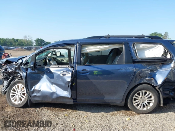 2014 Toyota Sienna XLE with VIN 5TDYK3DCXES524294, listed as a IAAI auction lot 42546467 with 122,257 mi miles and . Bid and sale history available at DreamBid. Image 14.