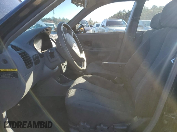 2005 Hyundai Accent GLS z VIN KMHCG45C15U662362, wystawiony jako Copart lot #80574774 z przebiegiem 122 898 mil mil oraz Szkoda całkowita • Salvage title. Historia ofert i sprzedaży dostępna na DreamBid. Obrazek 7.