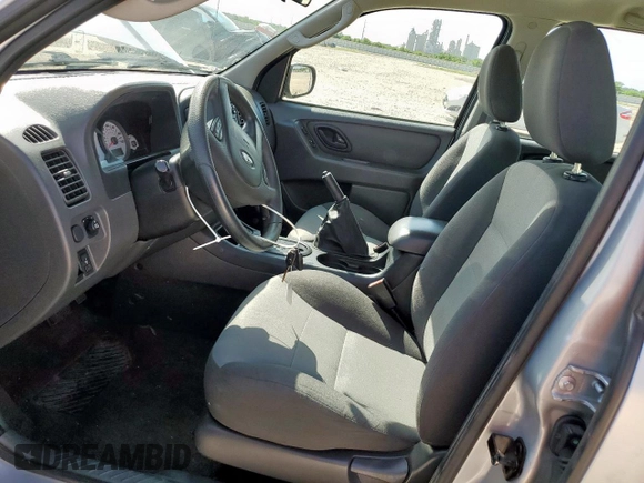 2007 Ford Escape XLS with VIN 1FMYU02Z87KB60530, listed as a Copart auction lot 61273345 with 57,574 mi miles and Salvage title. Bid and sale history available at DreamBid. Image 7.