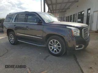 2018 GMC Yukon Denali with VIN 1GKS1CKJ4JR244135, listed as a Copart auction lot 71445964 with 148,375 mi miles and Salvage Title. Bid and sale history available at carsss.com. Image 4.
