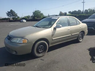 2000 Nissan Sentra XE with VIN 3N1CB51D3YL334871, listed as a Copart auction lot 57527415 with 219,390 mi miles and Salvage title. Bid and sale history available at DreamBid. Image 1.