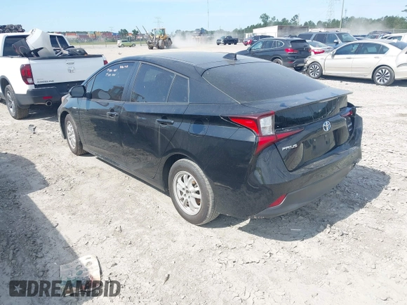 2021 Toyota Prius L Eco with VIN JTDKAMFU6M3141392, listed as a IAAI auction lot 42317866 with 137,495 mi miles and . Bid and sale history available at DreamBid. Image 3.
