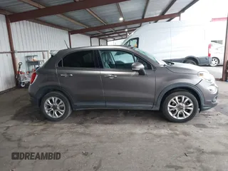 2016 FIAT 500X Easy z VIN ZFBCFXBTXGP349005, wystawiony jako IAAI lot #41163593 z przebiegiem 69 012 mil mil oraz . Historia ofert i sprzedaży dostępna na DreamBid. Obrazek 13.