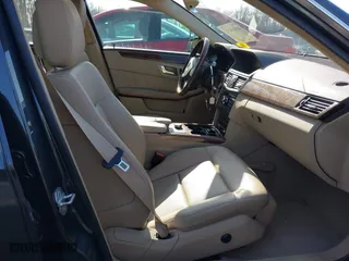 2013 Mercedes-Benz E-Class E 350 Luxury with VIN WDDHF8JB0DA707640, listed as a IAAI auction lot 41916454 with 104,469 mi miles. Bid and sale history available at carsss.com. Image 5.