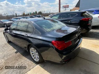 2012 BMW 7 Series 740Li with VIN WBAKB4C55CC576166, listed as a Copart auction lot 52448115 with 154,949 mi miles and Clean Title. Bid and sale history available at carsss.com. Image 3.