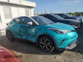 2018 Toyota C-HR XLE with VIN NMTKHMBX2JR041827, listed as a Copart auction lot 50443105 with 135,667 mi miles and Salvage title. Bid and sale history available at DreamBid. Image 4.