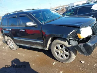 2008 Jeep Grand Cherokee Laredo with VIN 1J8GR48K98C193110, listed as a IAAI auction lot 41833331 with 174,518 mi miles. Bid and sale history available at carsss.com. Image 14.
