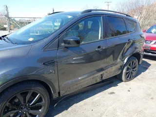 2017 Ford Escape SE with VIN 1FMCU9GD9HUC84906, listed as a IAAI auction lot 41762989 with 147,721 mi miles. Bid and sale history available at carsss.com. Image 6.