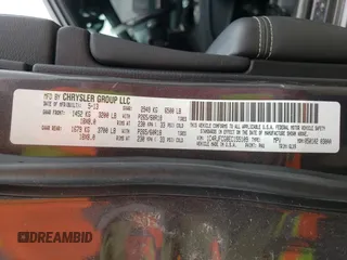 2014 Jeep Grand Cherokee Overland with VIN 1C4RJFCG8EC155109, listed as a Copart auction lot 52992825 with 128,604 mi miles and Clean Title. Bid and sale history available at carsss.com. Image 13.