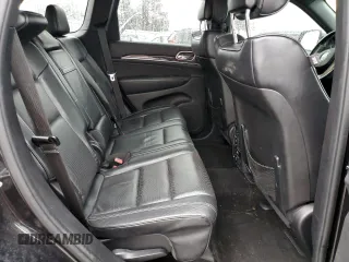 2015 Jeep Grand Cherokee Overland with VIN 1C4RJFCG7FC925995, listed as a Copart auction lot 85421214 with 142,266 mi miles and Salvage Title. Bid and sale history available at carsss.com. Image 11.
