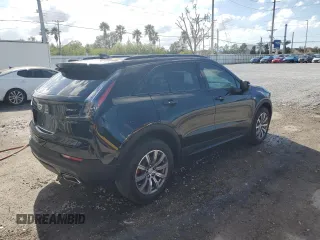 2021 Cadillac XT4 FWD Sport with VIN 1GYFZER44MF080872, listed as a Copart auction lot 86344534 with 23,865 mi miles and Salvage Title. Bid and sale history available at DreamBid. Image 3.