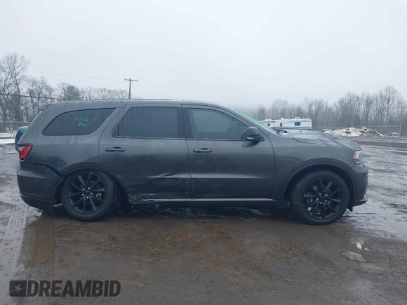 2018 Dodge Durango R/T with VIN 1C4SDJCT9JC445216, listed as a IAAI auction lot 41533601 with 87,049 mi miles and . Bid and sale history available at DreamBid. Image 14.