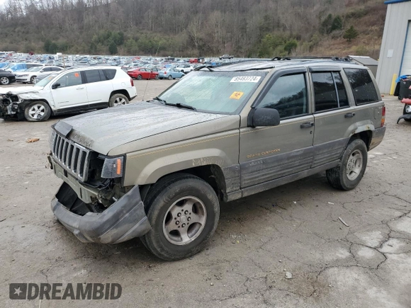 1996 Jeep Grand Cherokee Laredo with VIN 1J4GZ58Y5TC378100, listed as a Copart auction lot 85493724 with 0 mi miles and Salvage Title. Bid and sale history available at carsss.com. Image 1.