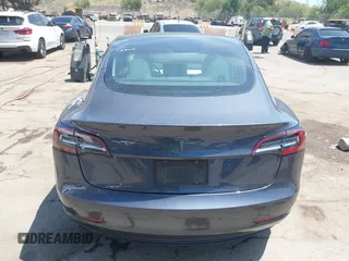 2020 Tesla Model 3 Standard Range Plus with VIN 5YJ3E1EAXLF615781, listed as a IAAI auction lot 42068935 with 96,026 mi miles. Bid and sale history available at carsss.com. Image 16.