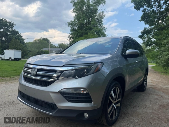 2018 Honda Pilot Touring z VIN 5FNYF6H94JB070661, wystawiony jako Copart lot #60926415 z przebiegiem 205 538 mil mil oraz Czysty tytuł • Clean title. Historia ofert i sprzedaży dostępna na DreamBid. Obrazek 2.
