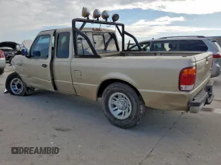 1999 Ford Ranger XL with VIN 1FTYR14VXXPA72216, listed as a Copart auction lot 61868295 with 230,074 mi miles and Salvage title. Bid and sale history available at DreamBid. Image 2.