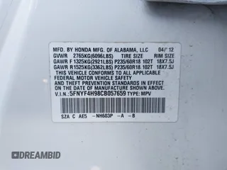 2012 Honda Pilot Touring with VIN 5FNYF4H98CB057659, listed as a IAAI auction lot 41927990 with 140,000 mi miles. Bid and sale history available at carsss.com. Image 9.