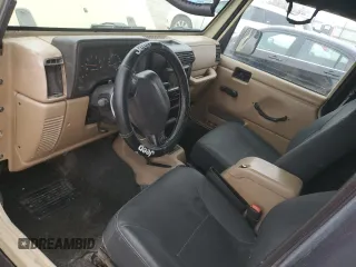 2001 Jeep Wrangler Sport с VIN 1J4FA49S71P312113, выставлен на аукционе Copart как лот 51168125 с пробегом 120 683 миль миль и Списание • Salvage title. История ставок и продаж доступна на DreamBid. Изображение 8.