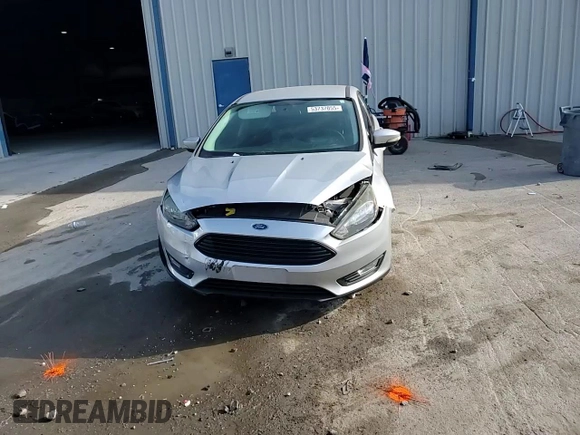 2017 Ford Focus SE with VIN 1FADP3FE9HL273889, listed as a Copart auction lot 53737055 with 114,700 mi miles and Salvage Title. Bid and sale history available at DreamBid. Image 13.