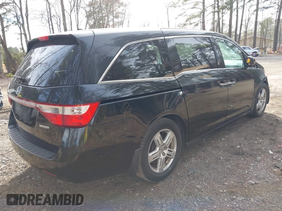 2013 Honda Odyssey Touring with VIN 5FNRL5H96DB003796, listed as a IAAI auction lot 41828376 with 6,308 mi miles and . Bid and sale history available at carsss.com. Image 4.