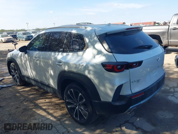 2024 Mazda CX-50 Premium z VIN 7MMVABDY3RN207237, wystawiony jako IAAI lot #41044580 z przebiegiem 3381 mil mil oraz . Historia ofert i sprzedaży dostępna na DreamBid. Obrazek 3.