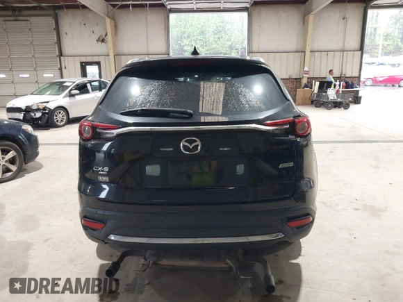 2016 Mazda CX-9 Signature z VIN JM3TCBEY5G0111286, wystawiony jako IAAI lot #42018161 z przebiegiem 155 920 mil mil oraz . Historia ofert i sprzedaży dostępna na DreamBid. Obrazek 16.