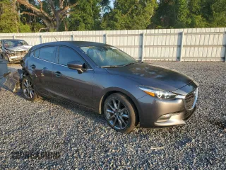 2018 Mazda 3 Touring z VIN 3MZBN1L33JM235106, wystawiony jako Copart lot #58272365 z przebiegiem 28 844 mil mil oraz Szkoda całkowita • Salvage title. Historia ofert i sprzedaży dostępna na DreamBid. Obrazek 4.