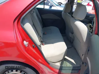 2009 Toyota Yaris z VIN JTDBT903791320843, wystawiony jako IAAI lot #42390510 z przebiegiem 331 439 mil mil oraz . Historia ofert i sprzedaży dostępna na DreamBid. Obrazek 8.