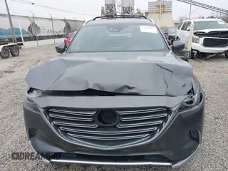 2016 Mazda CX-9 Grand Touring with VIN JM3TCBDY1G0103560, listed as a IAAI auction lot 41344813 with 123,588 mi miles and . Bid and sale history available at DreamBid. Image 12.