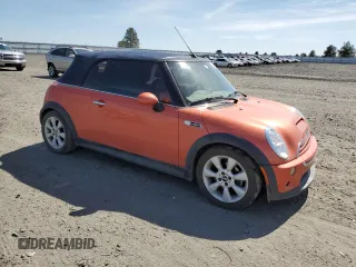 2005 MINI Convertible S with VIN WMWRH33485TF81057, listed as a Copart auction lot 53290165 with 95,123 mi miles and Salvage Title. Bid and sale history available at DreamBid. Image 4.