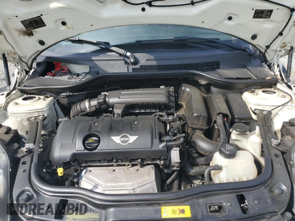 2013 MINI Hardtop с VIN WMWSU3C57DT681944, выставлен на аукционе Copart как лот 60126245 с пробегом 118 319 миль миль и Списание • Salvage title. История ставок и продаж доступна на DreamBid. Изображение 11.