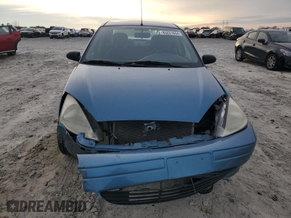 2001 Ford Focus LX with VIN 1FAHP33P01W332260, listed as a Copart auction lot 83221654 with 104,028 mi miles and Salvage Title. Bid and sale history available at DreamBid. Image 5.