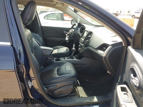 2015 Jeep Cherokee Limited with VIN 1C4PJMDS5FW649720, listed as a IAAI auction lot 42046740 with 158,147 mi miles. Bid and sale history available at carsss.com. Image 5.