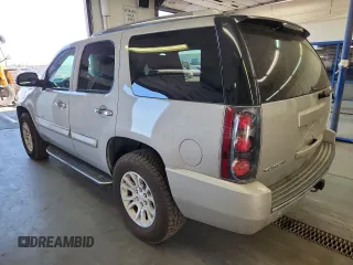 2007 GMC Yukon Denali z VIN 1GKFK63867J362741, wystawiony jako Copart lot #59442875 z przebiegiem 198 247 mil mil oraz Czysty tytuł • Clean title. Historia ofert i sprzedaży dostępna na DreamBid. Obrazek 2.