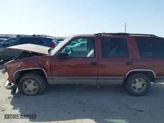 1999 Chevrolet Tahoe with VIN 1GNEC13R9XJ341261, listed as a IAAI auction lot 41741710 with 234,676 mi miles. Bid and sale history available at carsss.com. Image 13.