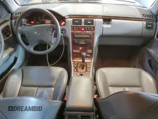 2000 Mercedes-Benz E-Class AWD with VIN WDBJF82G4YX027683, listed as a Copart auction lot 77146524 with 228,654 mi miles and Clean Title. Bid and sale history available at carsss.com. Image 8.