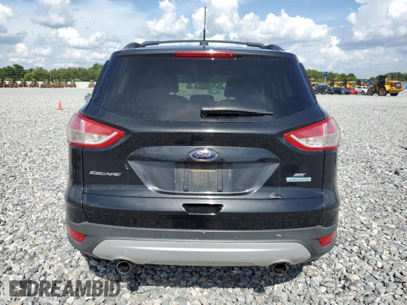 2013 Ford Escape SE with VIN 1FMCU0G94DUB72273, listed as a Copart auction lot 64097315 with 213,409 mi miles and Clean title. Bid and sale history available at DreamBid. Image 6.
