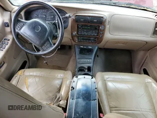 2000 Mercury Mountaineer with VIN 4M2ZU86P2YUJ30049, listed as a Copart auction lot 58619545 with 149,673 mi miles and Salvage title. Bid and sale history available at DreamBid. Image 8.