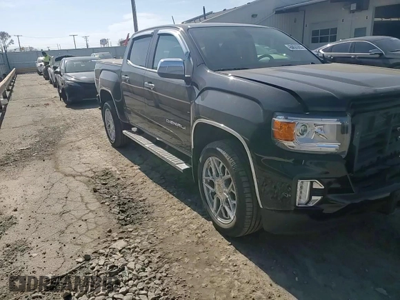 2021 GMC Canyon 4WD Denali with VIN 1GTG6EEN4M1221938, listed as a Copart auction lot 48760965 with 63,231 mi miles and Salvage Title. Bid and sale history available at carsss.com. Image 11.