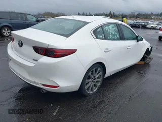 2020 Mazda 3 Premium with VIN 3MZBPBEMXLM133357, listed as a IAAI auction lot 41540234 with 81,280 mi miles and . Bid and sale history available at DreamBid. Image 4.