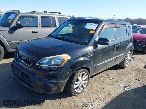 2012 Kia Soul + with VIN KNDJT2A60C7399403, listed as a IAAI auction lot 41820476 with 106,045 mi miles. Bid and sale history available at carsss.com. Image 2.