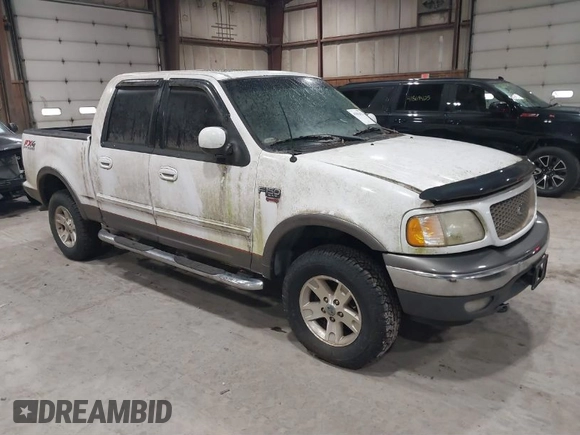 2002 Ford F-150 XLT with VIN 1FTRW08L02KE16948, listed as a IAAI auction lot 41881612 with 168,471 mi miles. Bid and sale history available at carsss.com. Image 1.