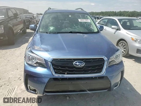 2017 Subaru Forester Touring with VIN JF2SJGTC2HH404923, listed as a Copart auction lot 58091885 with 101,317 mi miles and Salvage title. Bid and sale history available at DreamBid. Image 13.